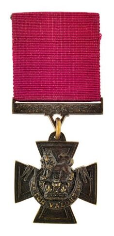 Victoria Cross medal with crimson ribbon